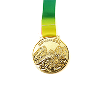 Gold plated frosted engraved landscape medal