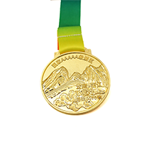 Gold plated frosted engraved landscape medal